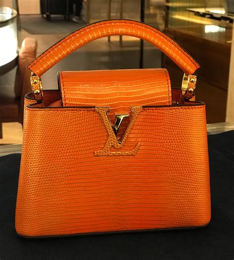 lv orange backpack|louis vuitton mm tote bag.